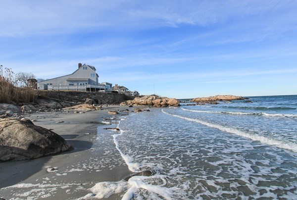23 Wyoma Road Gloucester, MA 01930 - Photo 2 of 22 a view of a dry yard with wooden fence