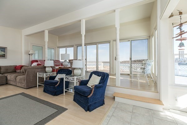23 Wyoma Road Gloucester, MA 01930 - Photo 4 of 22 a living room with furniture and a large window