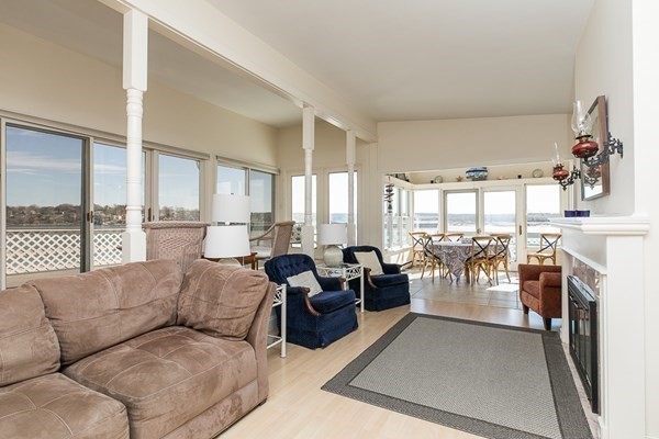 23 Wyoma Road Gloucester, MA 01930 - Photo 5 of 22 a living room with furniture and a fireplace