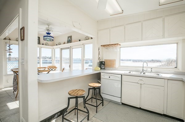 23 Wyoma Road Gloucester, MA 01930 - Photo 8 of 22 a kitchen with a sink and cabinets