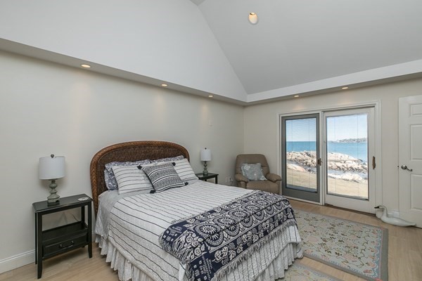 23 Wyoma Road Gloucester, MA 01930 - Photo 9 of 22 a bedroom with a bed and window
