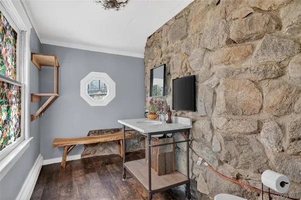 a view of a chairs and table in the patio