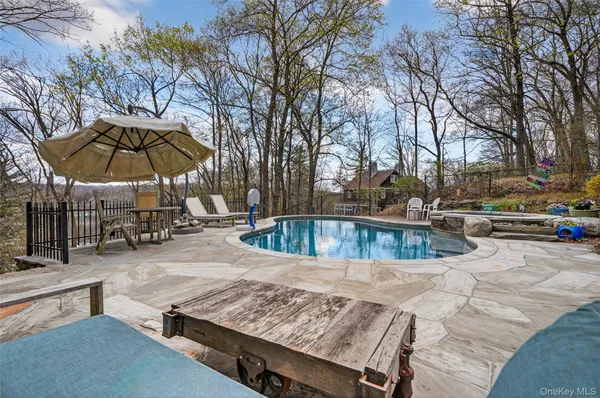 a view of a house with a swimming pool