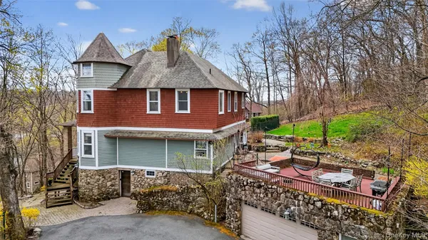 a view of a chairs and table in the garden