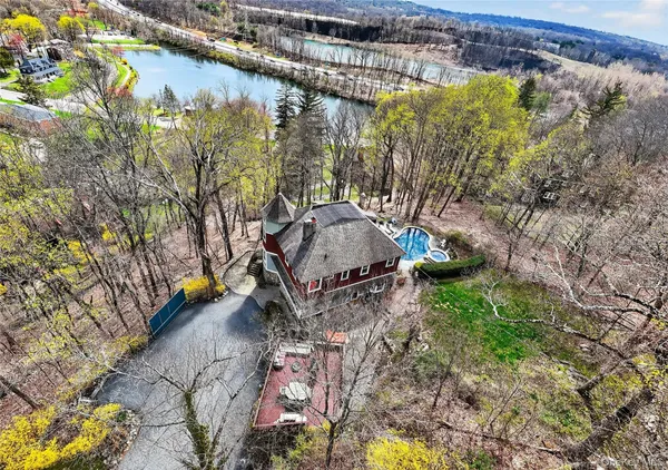 a view of a city with a lake