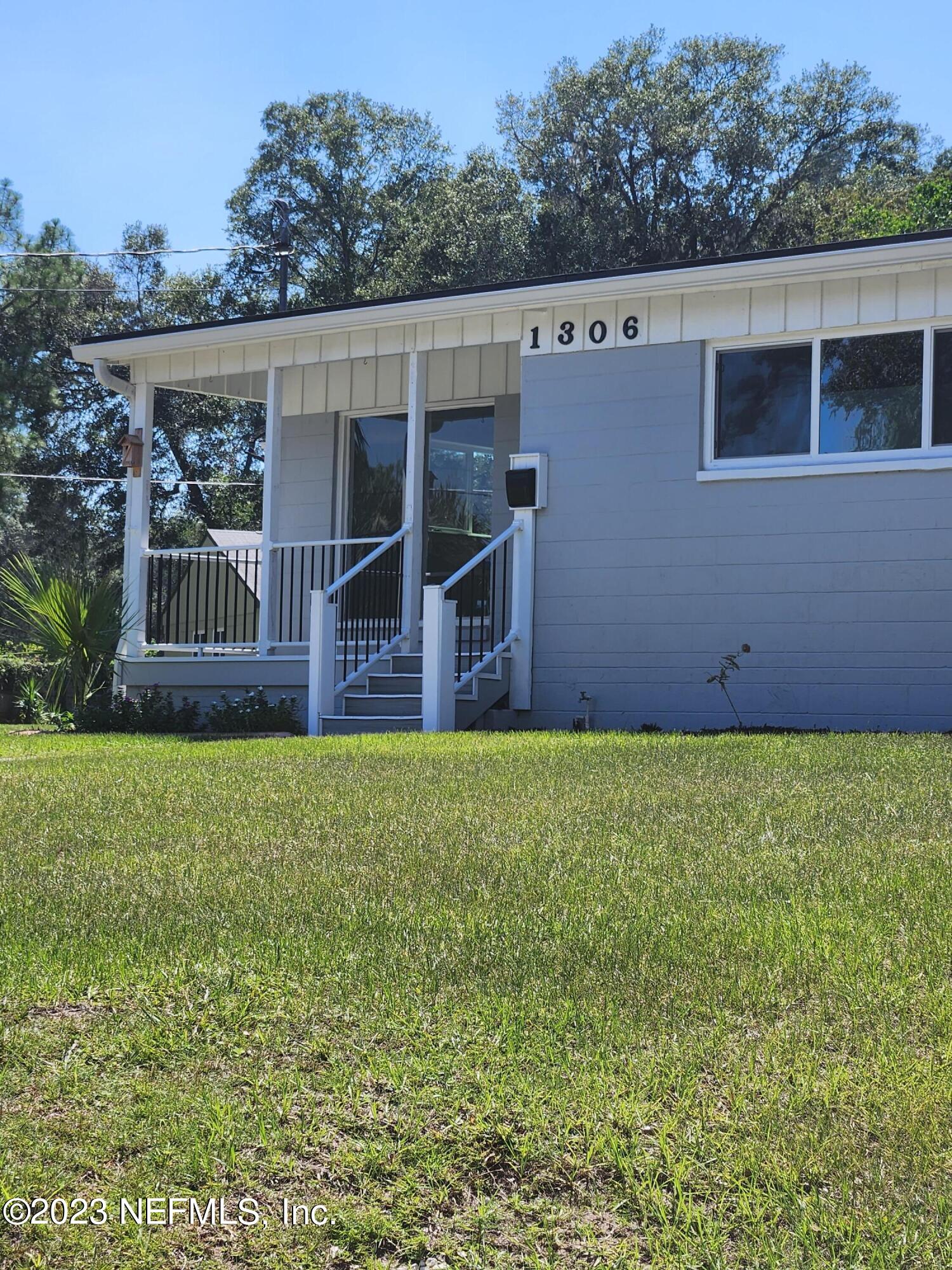 1306 Morgana Road Jacksonville, FL 32211 - Photo 2 of 33 a view of a house with wooden fence