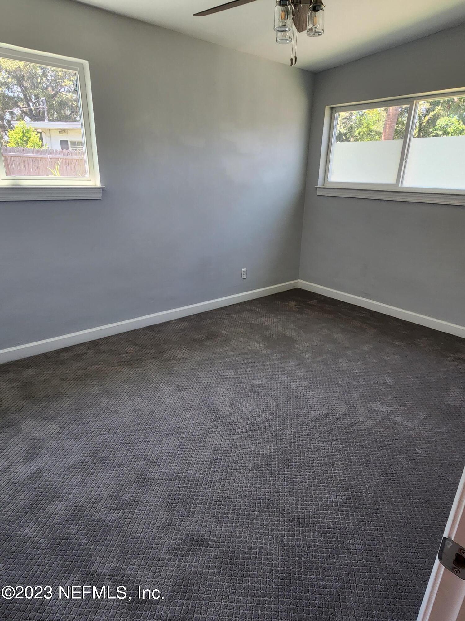 1306 Morgana Road Jacksonville, FL 32211 - Photo 27 of 33 an empty room with windows