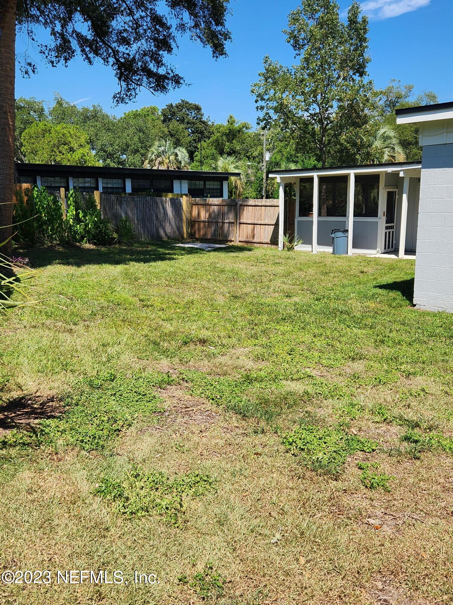 1306 Morgana Road Jacksonville, FL 32211 - Photo 29 of 33 a view of a house with a yard
