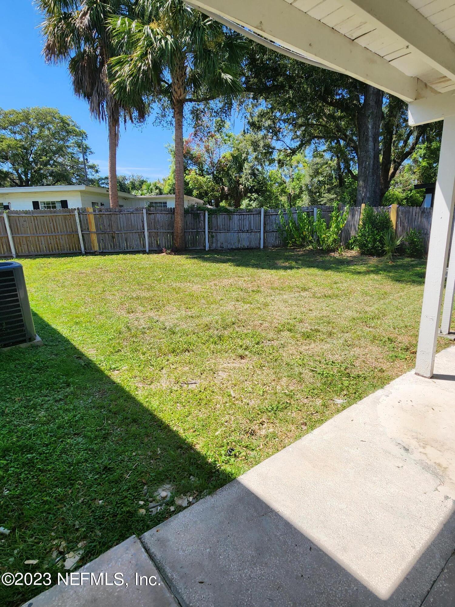 1306 Morgana Road Jacksonville, FL 32211 - Photo 30 of 33 a view of a swimming pool with a garden
