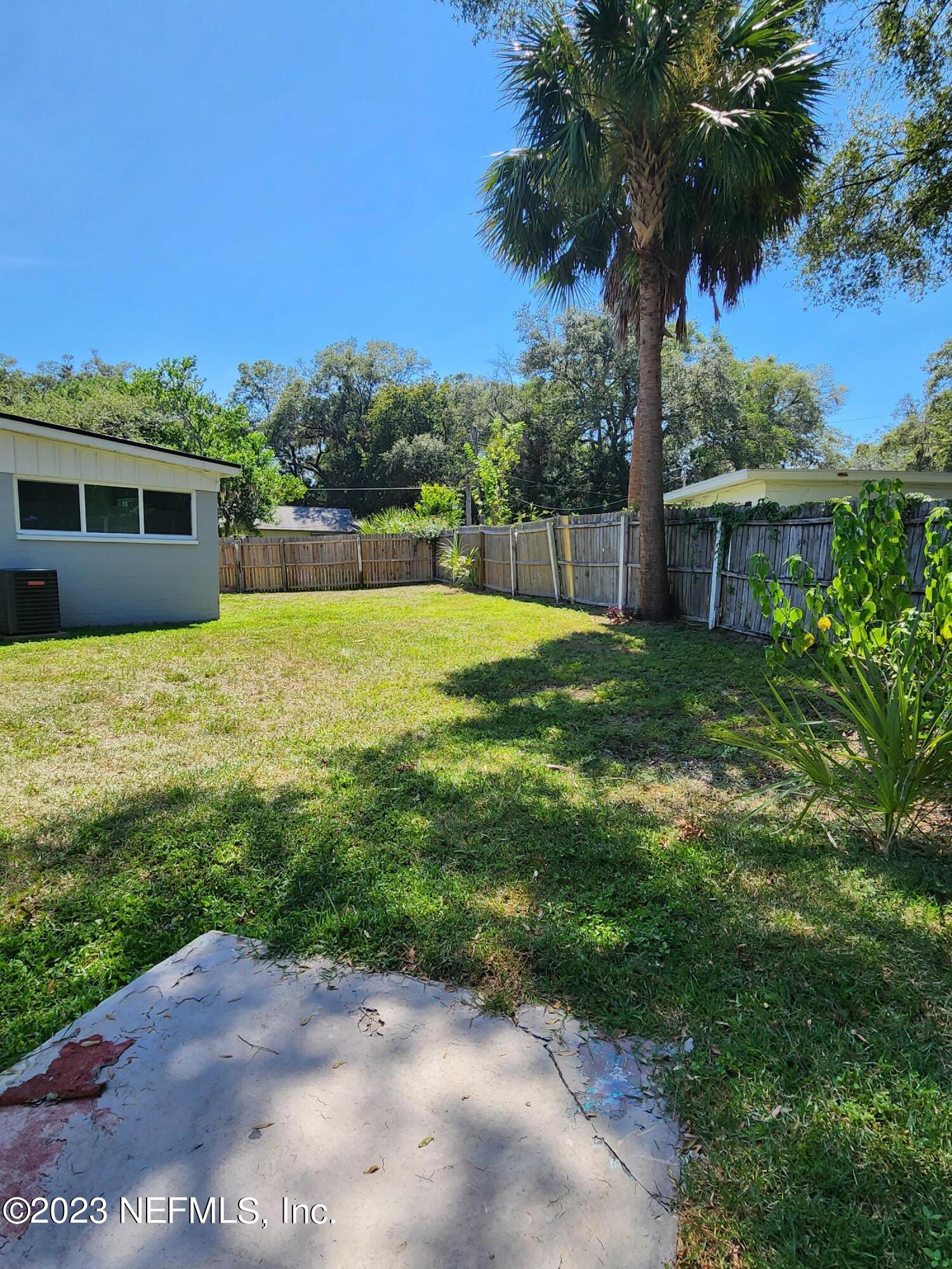 1306 Morgana Road Jacksonville, FL 32211 - Photo 32 of 33 a view of a backyard with a house