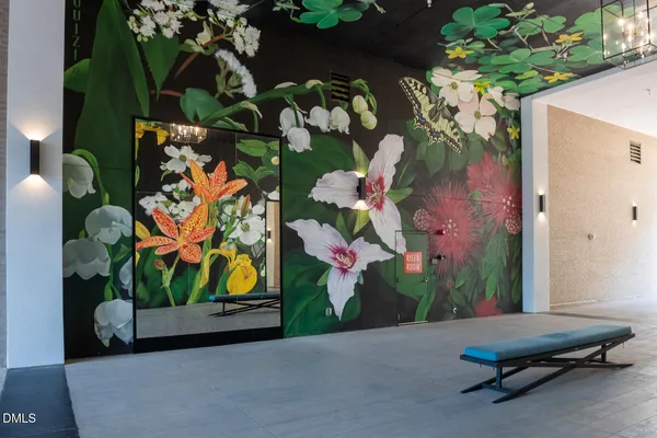 view of backyard with green space