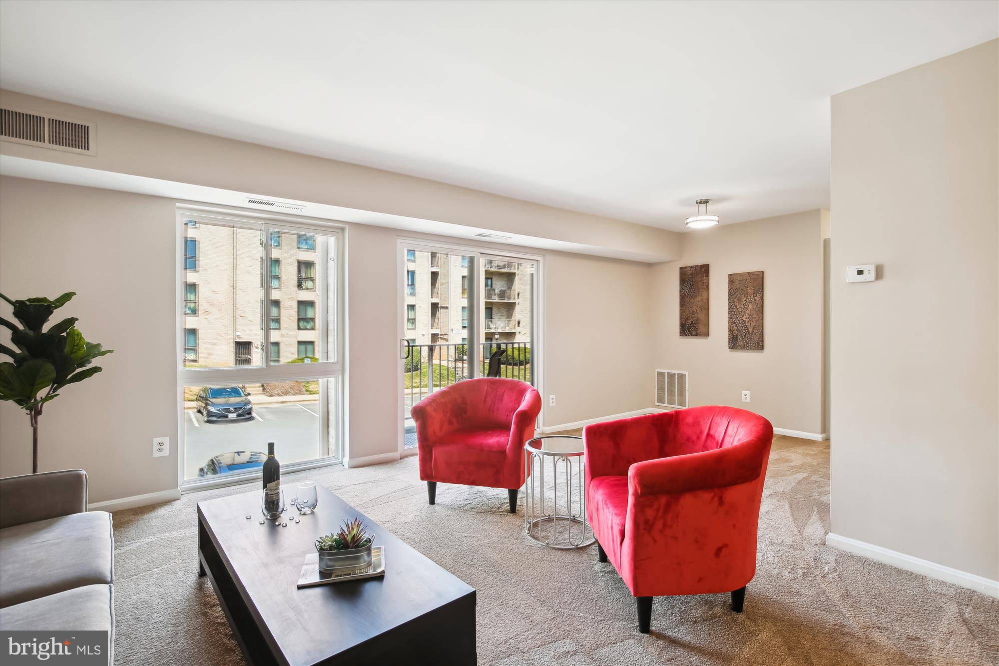 6143 Edsall Road, Unit H Alexandria, VA 22304 - Photo 3 of 18 a living room with furniture and wooden floor