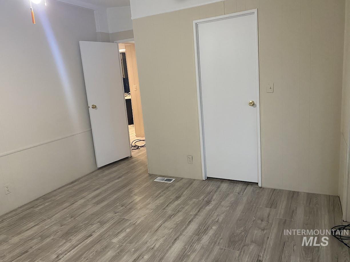 2015 6th Avenue, Unit 131A Clarkston, WA 99403 - Photo 12 of 26 Unfurnished bedroom featuring light wood-style flooring