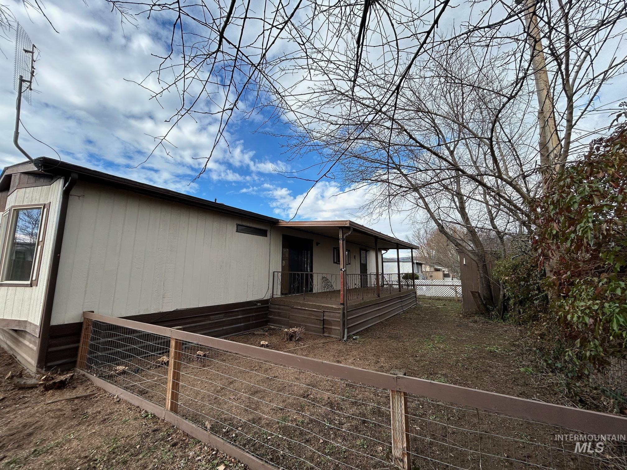 2015 6th Avenue, Unit 131A Clarkston, WA 99403 - Photo 22 of 26 View of back of property featuring a deck