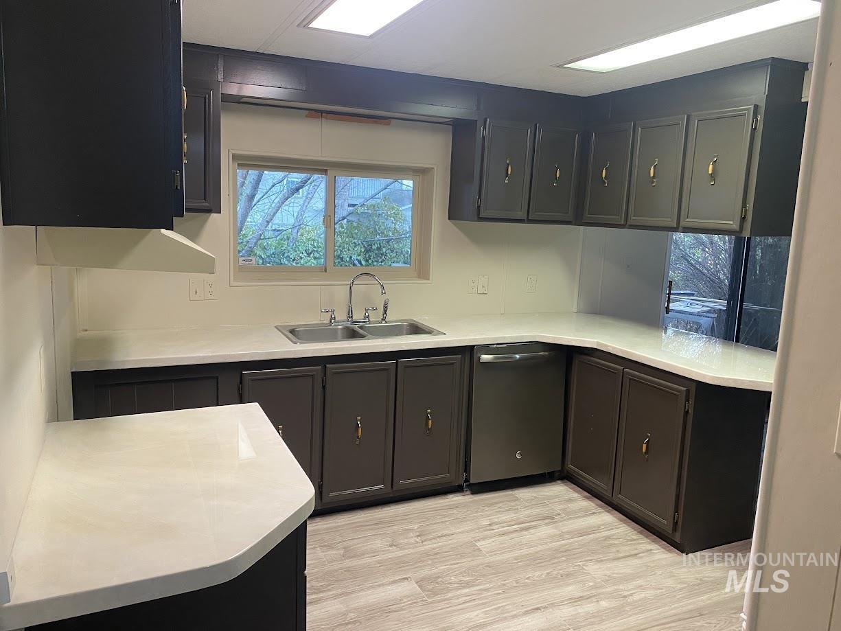 2015 6th Avenue, Unit 131A Clarkston, WA 99403 - Photo 4 of 13 Kitchen featuring dishwasher and light wood-type flooring