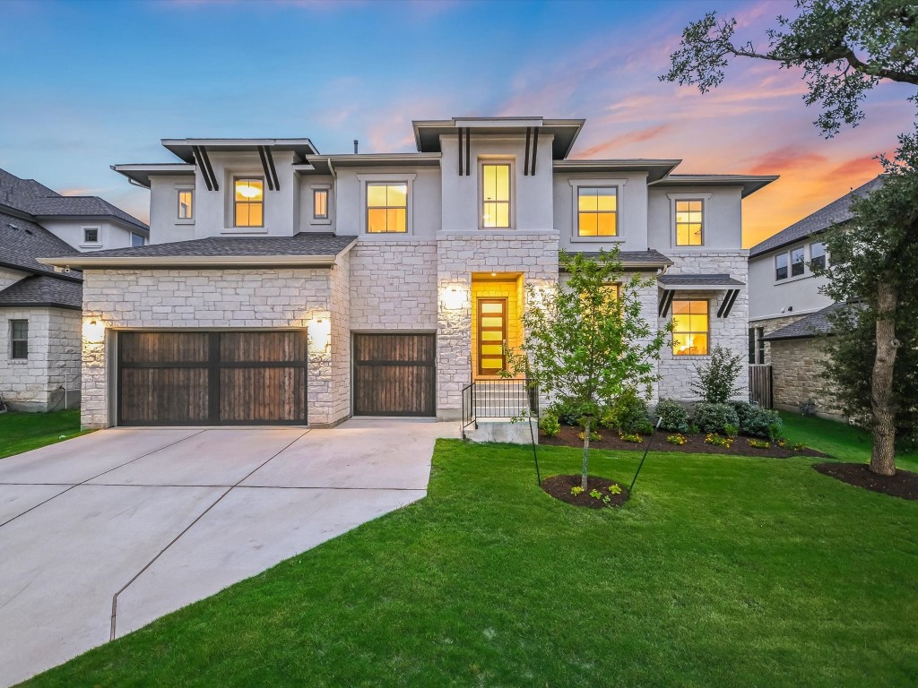 7208 Vicenza Drive Austin, TX 78739 - Photo 1 of 1 front view of a house with a yard