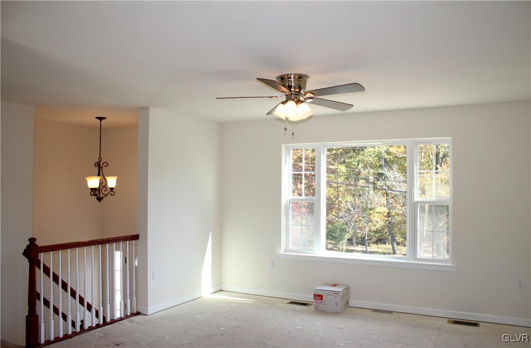 437 English Road Bath, PA 18014 - Photo 7 of 11 a view of an empty room with a window