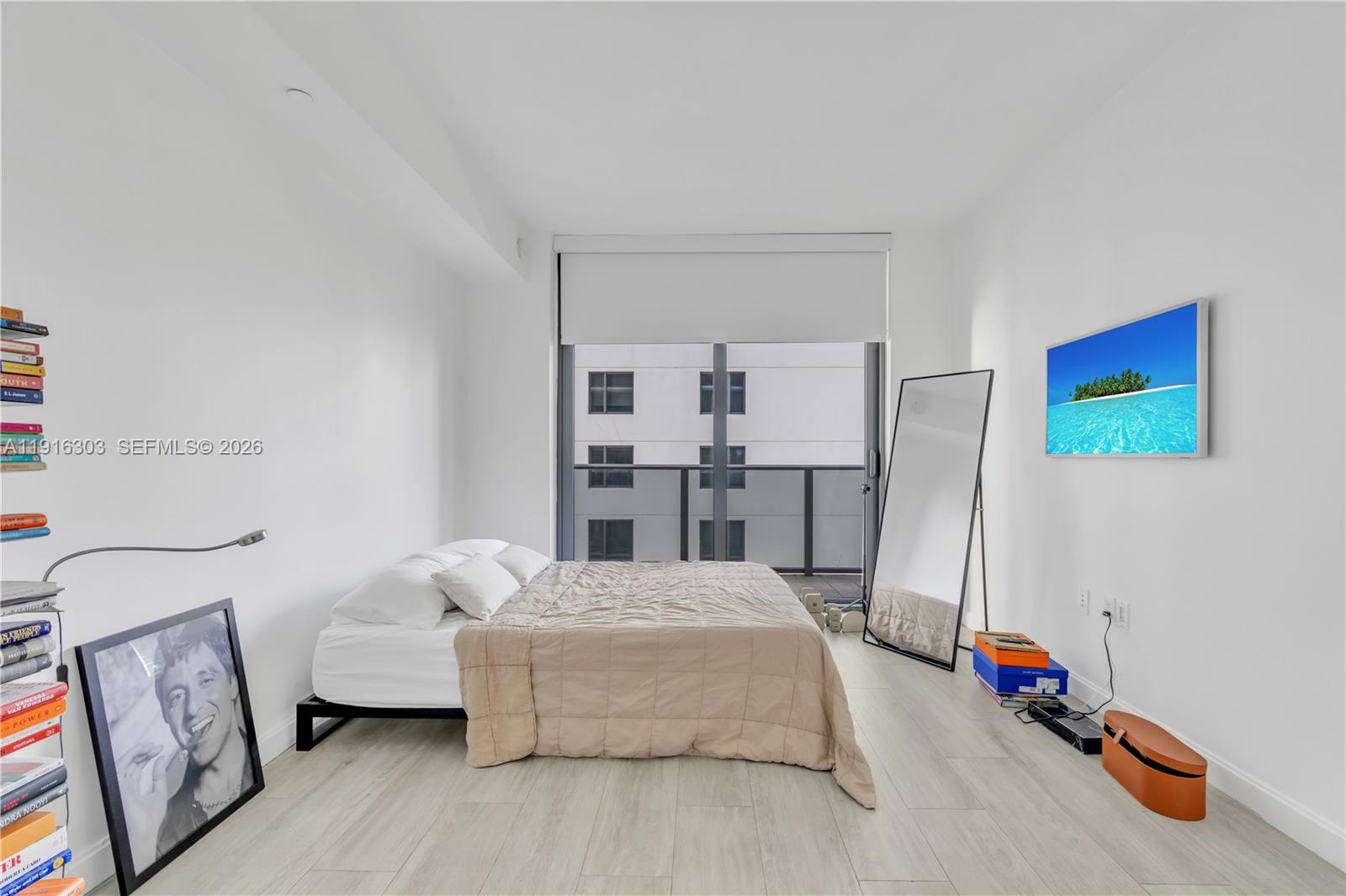 55 Southwest 9th Street, Unit 2610 Miami, FL 33130 - Photo 9 of 21 a living room with furniture and a couch