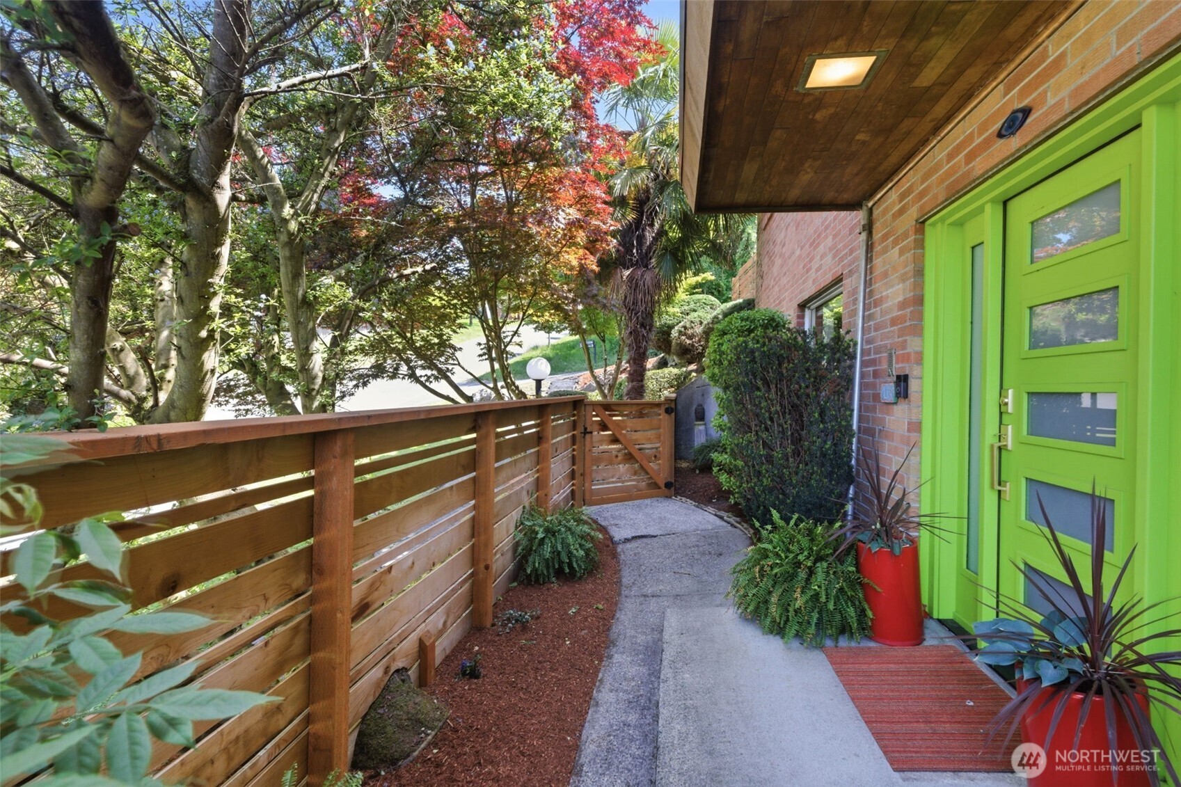 2803 South Walker Street Seattle, WA 98144 - Photo 3 of 40 a view of a garden with plants