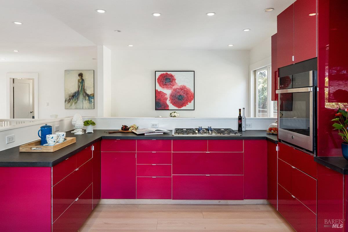 338 Paloma Avenue San Rafael, CA 94901 - Photo 12 of 31 a kitchen with red cabinets and sink