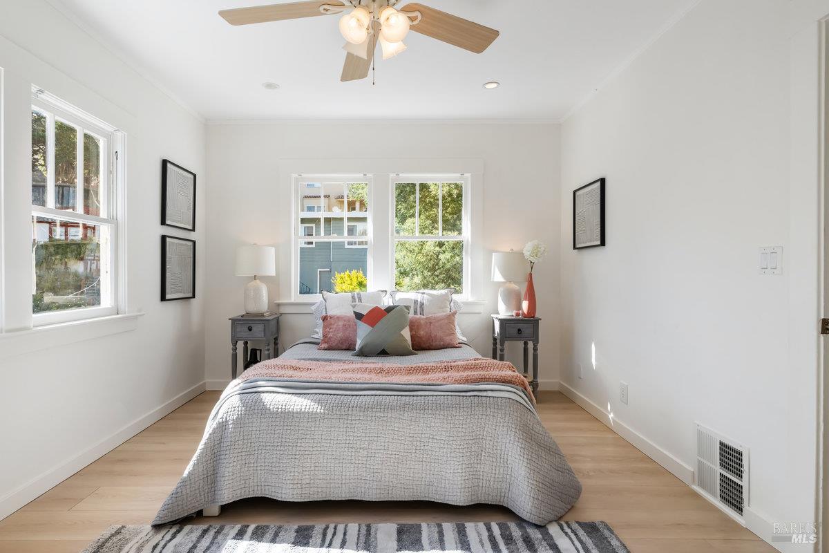 338 Paloma Avenue San Rafael, CA 94901 - Photo 18 of 31 a bedroom with a large bed and a window