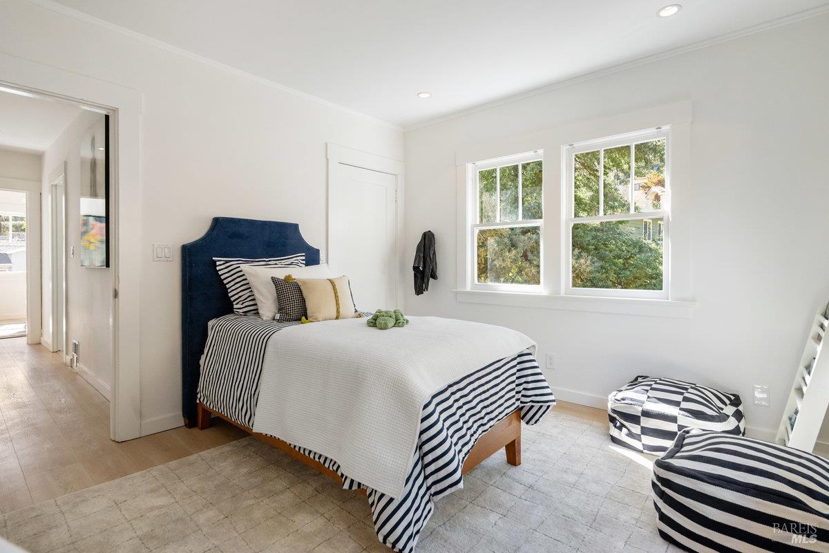 338 Paloma Avenue San Rafael, CA 94901 - Photo 20 of 31 a bedroom with a bed and a window