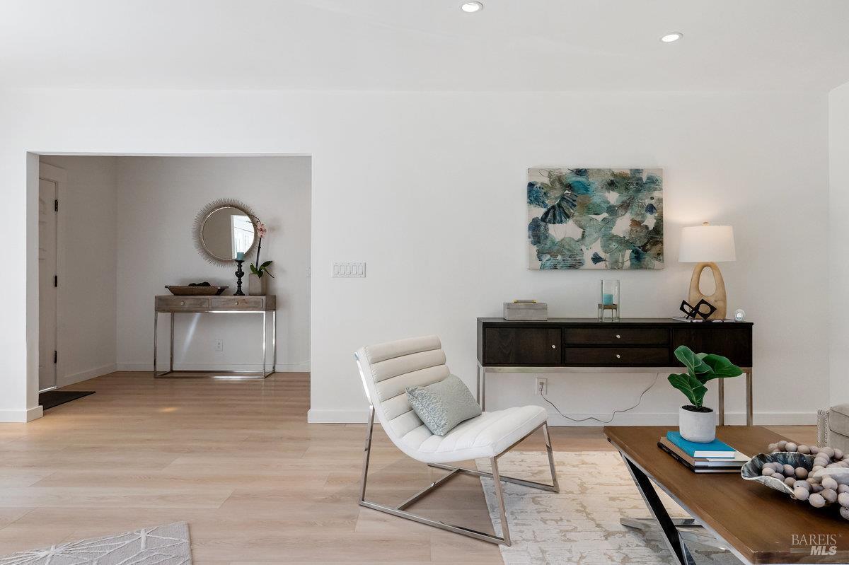 338 Paloma Avenue San Rafael, CA 94901 - Photo 6 of 31 a living room with furniture and a fireplace