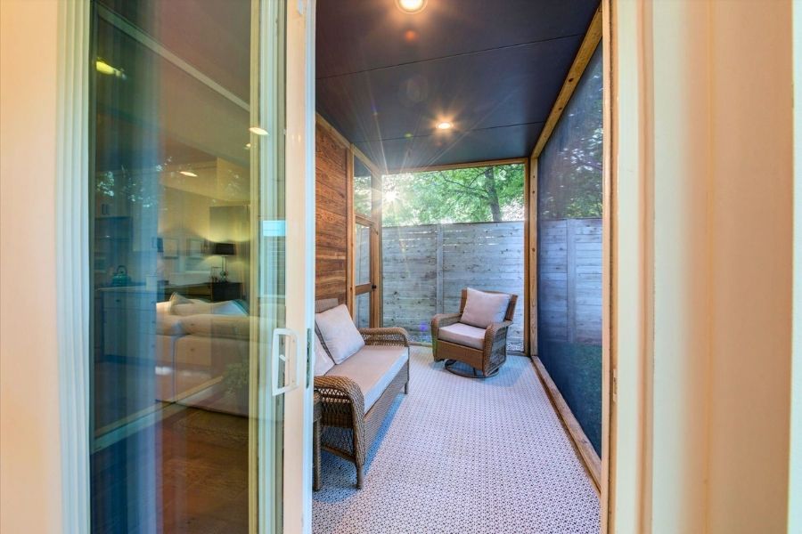 916 East 50th Street, Unit 1 Austin, TX 78751 - Photo 9 of 36 Screened-in porch off of the living/kitchen is the perfect spot to enjoy your morning coffee or relax with a glass of wine in the evening (without the bugs!)