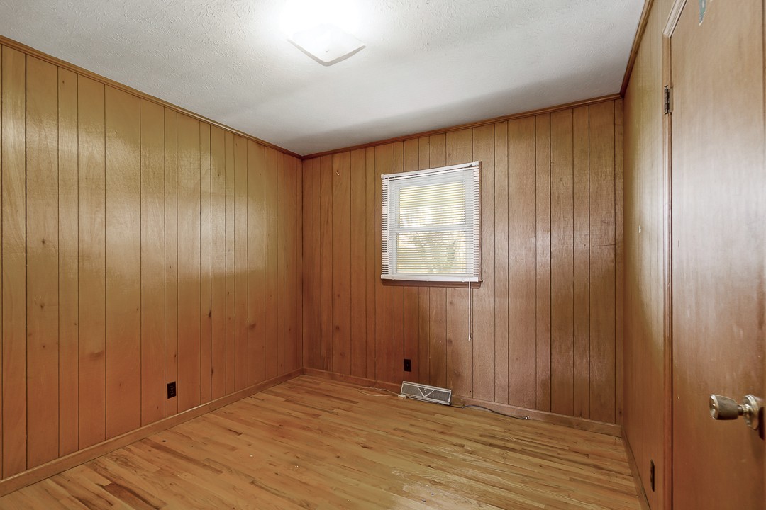 229 County House Road Sparta, TN 38583 - Photo 21 of 33 a view of an empty room with wooden floor