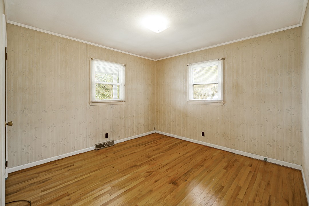 229 County House Road Sparta, TN 38583 - Photo 23 of 33 a view of empty room with wooden floor and fan