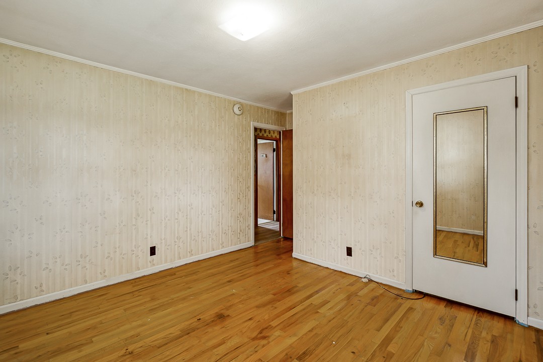 229 County House Road Sparta, TN 38583 - Photo 24 of 33 a view of an empty room with wooden floor and closet