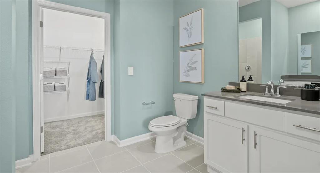 4246 St Thomas Way Kissimmee, FL 34758 - Photo 12 of 16 a bathroom with a sink toilet and shower