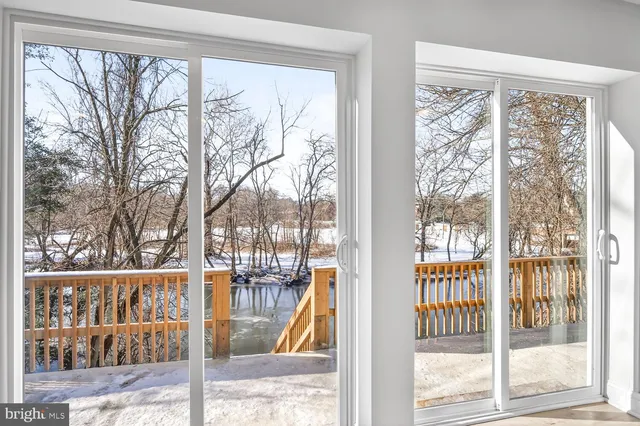 a view of a porch and wooden floor