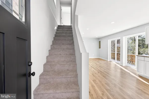 a view of an entryway with staircase