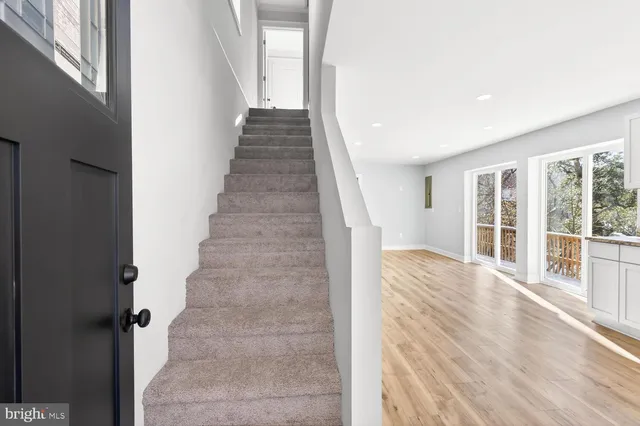 a view of an entryway with staircase