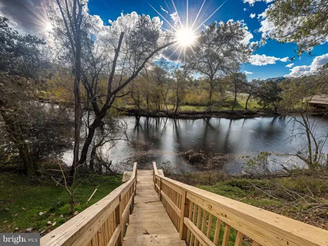 a view of a lake from a balcony