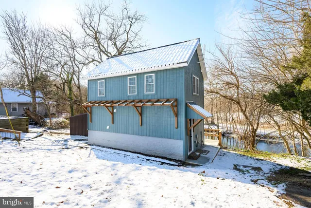 a view of a covered with snow on the road