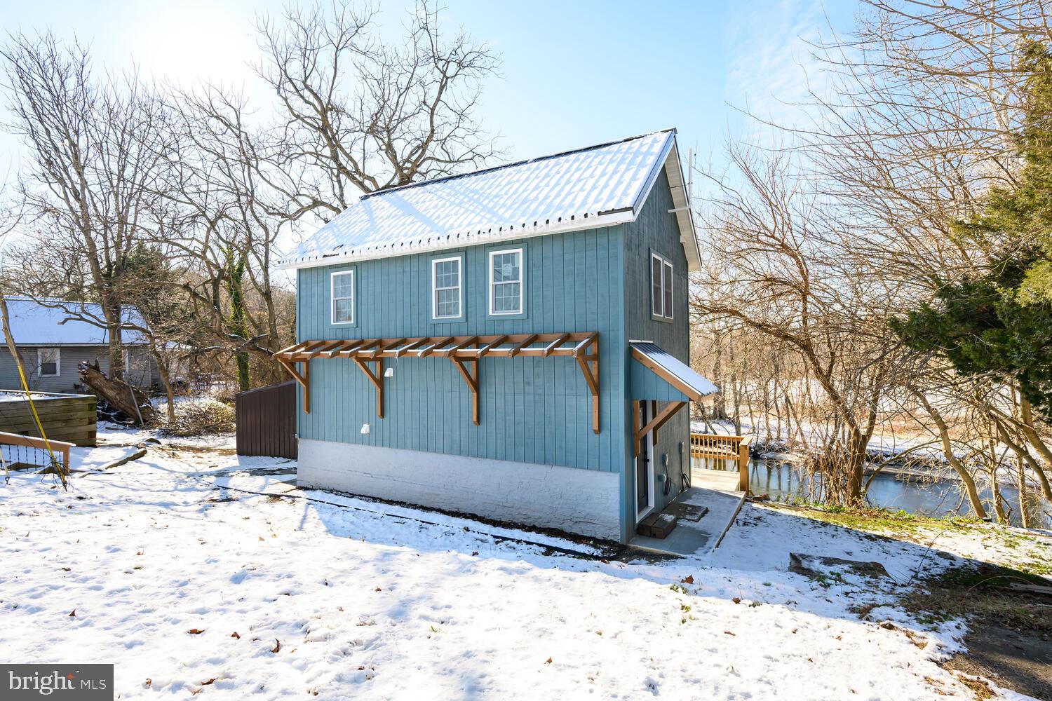 13306 Greensboro Road Greensboro, MD 21639 - Photo 35 of 48 a view of a covered with snow on the road