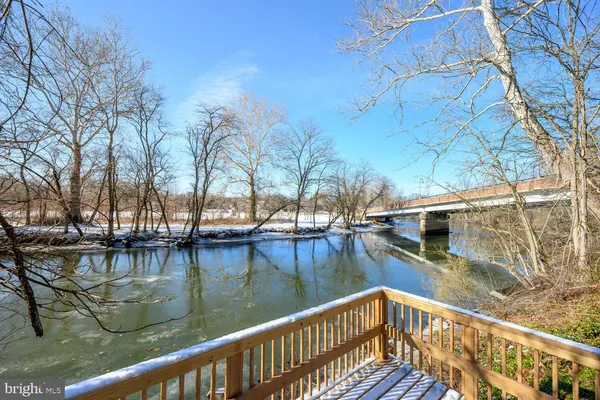 a view of swimming pool with a lake