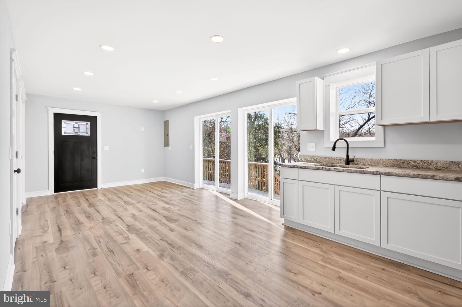 13306 Greensboro Road Greensboro, MD 21639 - Photo 6 of 48 a bedroom with a large bed and a large window