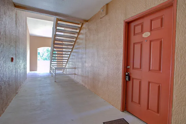a kitchen with stainless steel appliances a refrigerator stove and microwave