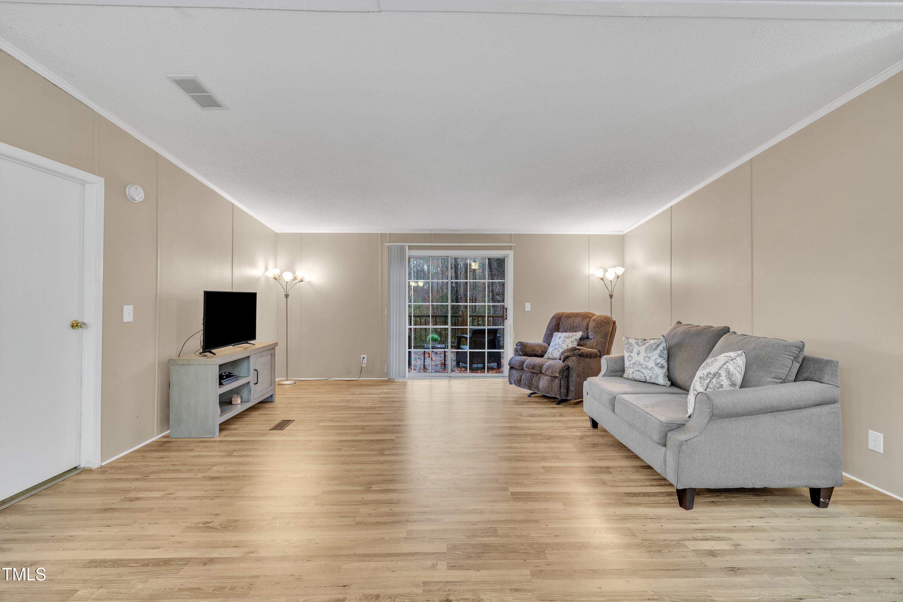 8412 South Creek Road Willow Spring, NC 27592 - Photo 8 of 29 Family Room