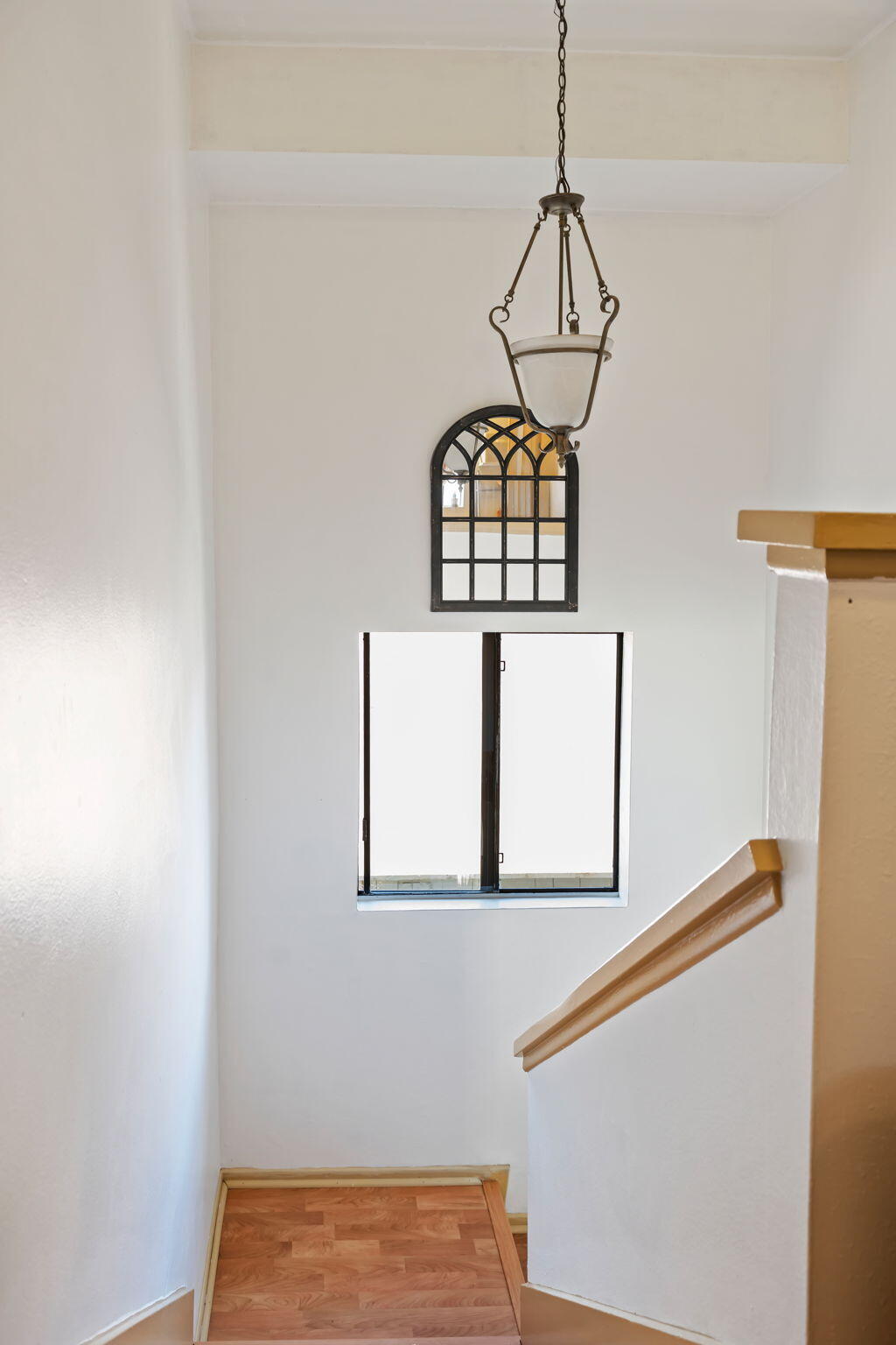 543 South E Street Oxnard, CA 93030 - Photo 15 of 30 a view of a hallway with wooden floor and a sink