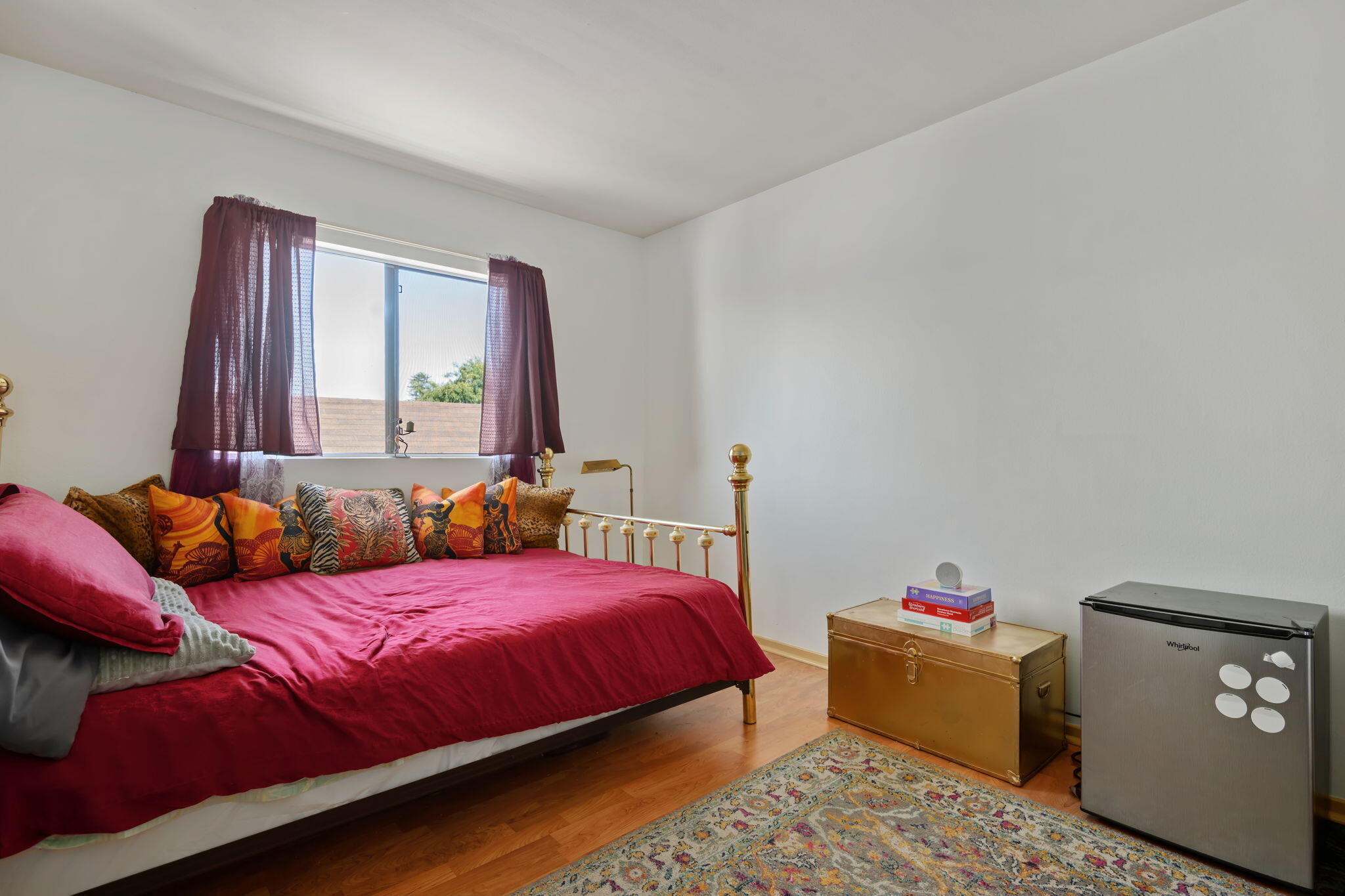 543 South E Street Oxnard, CA 93030 - Photo 20 of 30 a bedroom with a bed and a window