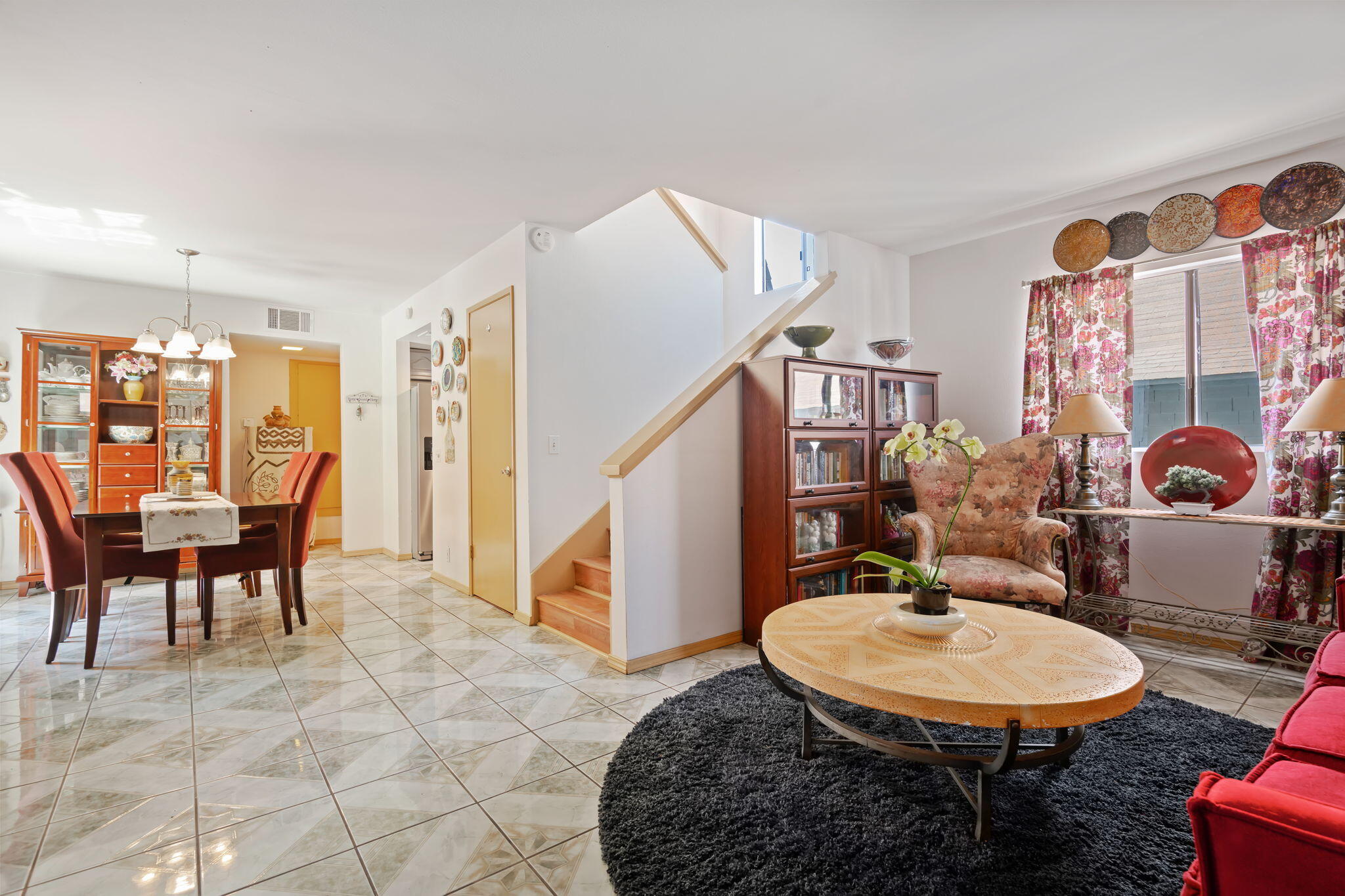 543 South E Street Oxnard, CA 93030 - Photo 7 of 30 a view of a dining room with furniture and a potted plant