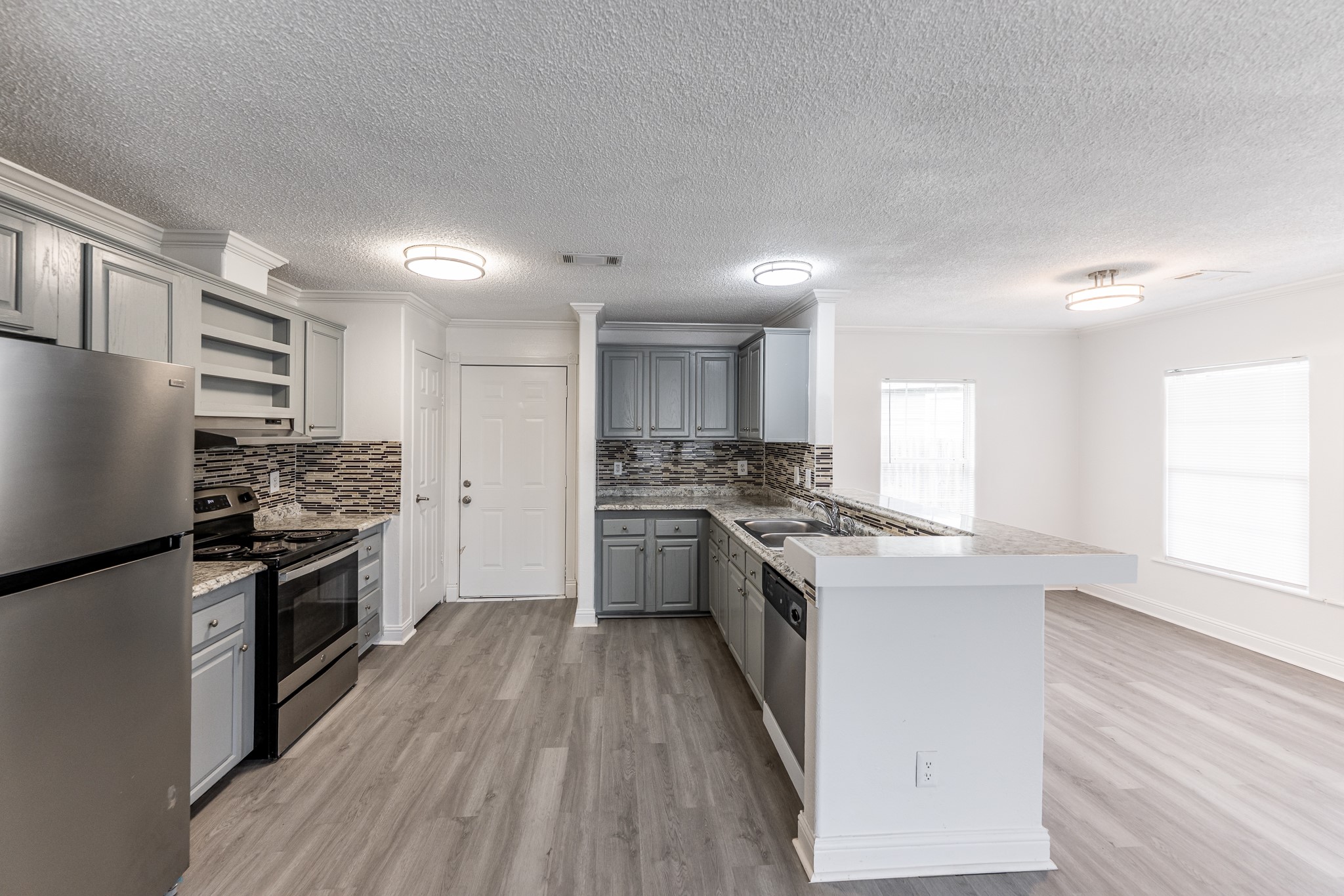 130 Varsity Drive Huntsville, TX 77340 - Photo 6 of 22 Photos show typical layout and finishes; actual unit may vary.