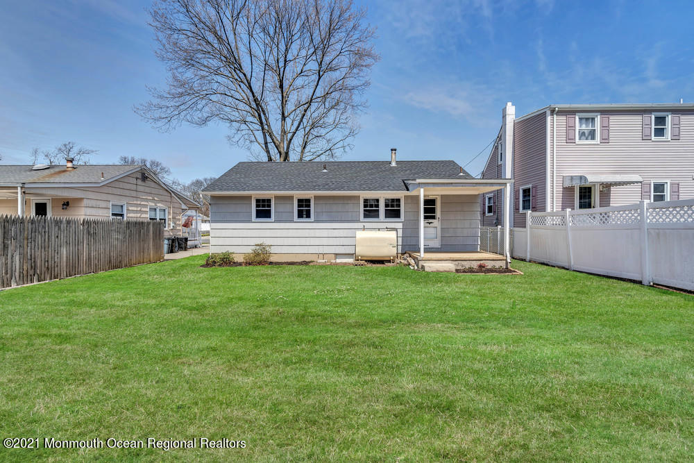 2210 Foster Road Point Pleasant, NJ 08742 - Photo 34 of 36 a front view of a house with a yard