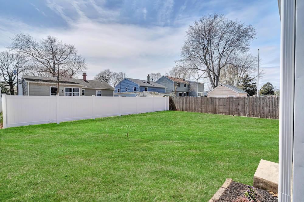2210 Foster Road Point Pleasant, NJ 08742 - Photo 36 of 36 a view of a back yard with green space