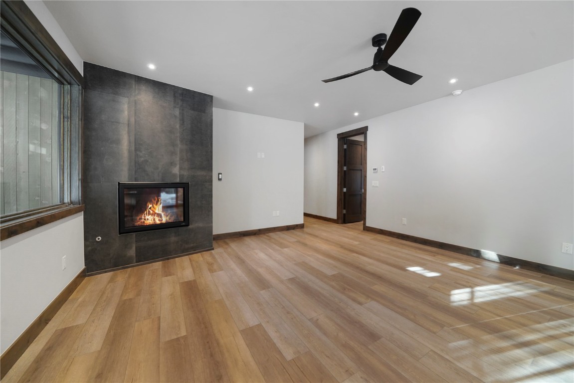 87 Independence Road Keystone, CO 80435 - Photo 24 of 25 a view of empty room with wooden floor and window