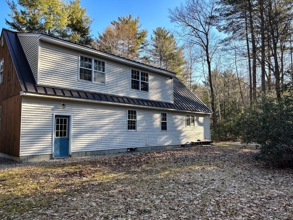 64 Pratt Corner Road Shutesbury, MA 01072 - Photo 8 of 42 a front view of house with yard
